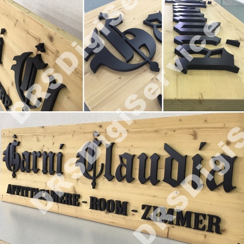 tabella in legno multistrato con lettere in forex nero
